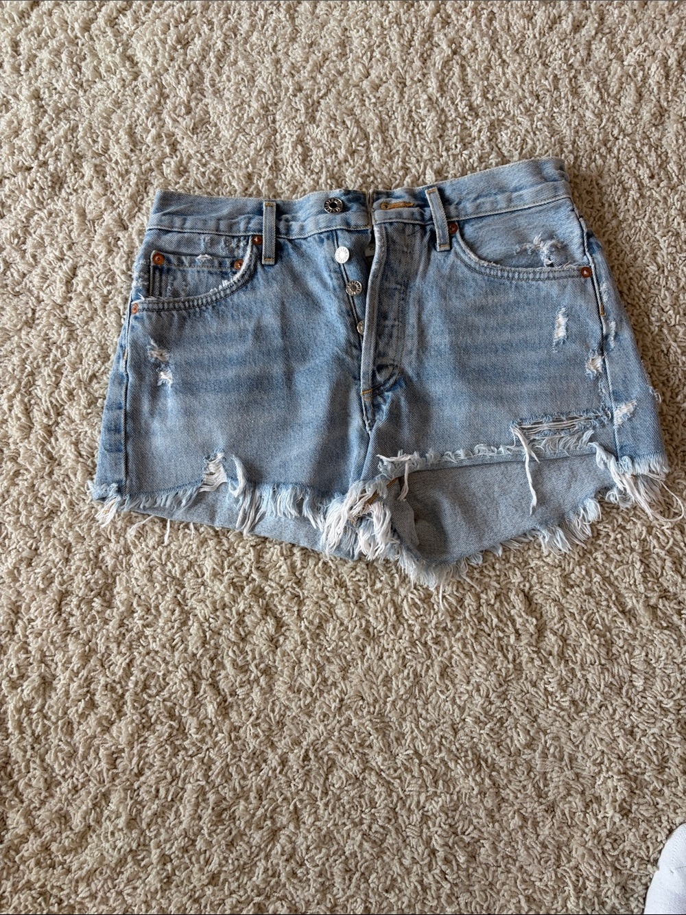 Agolde Light Blue Distressed Denim Cutoff Shorts
